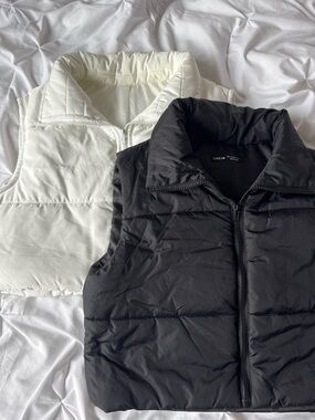 2 Pack puffer vests (white and black)